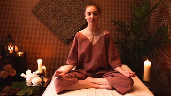 Luxurious spa treatment room with soft lighting and massage table prepared for ultimate relaxation experience